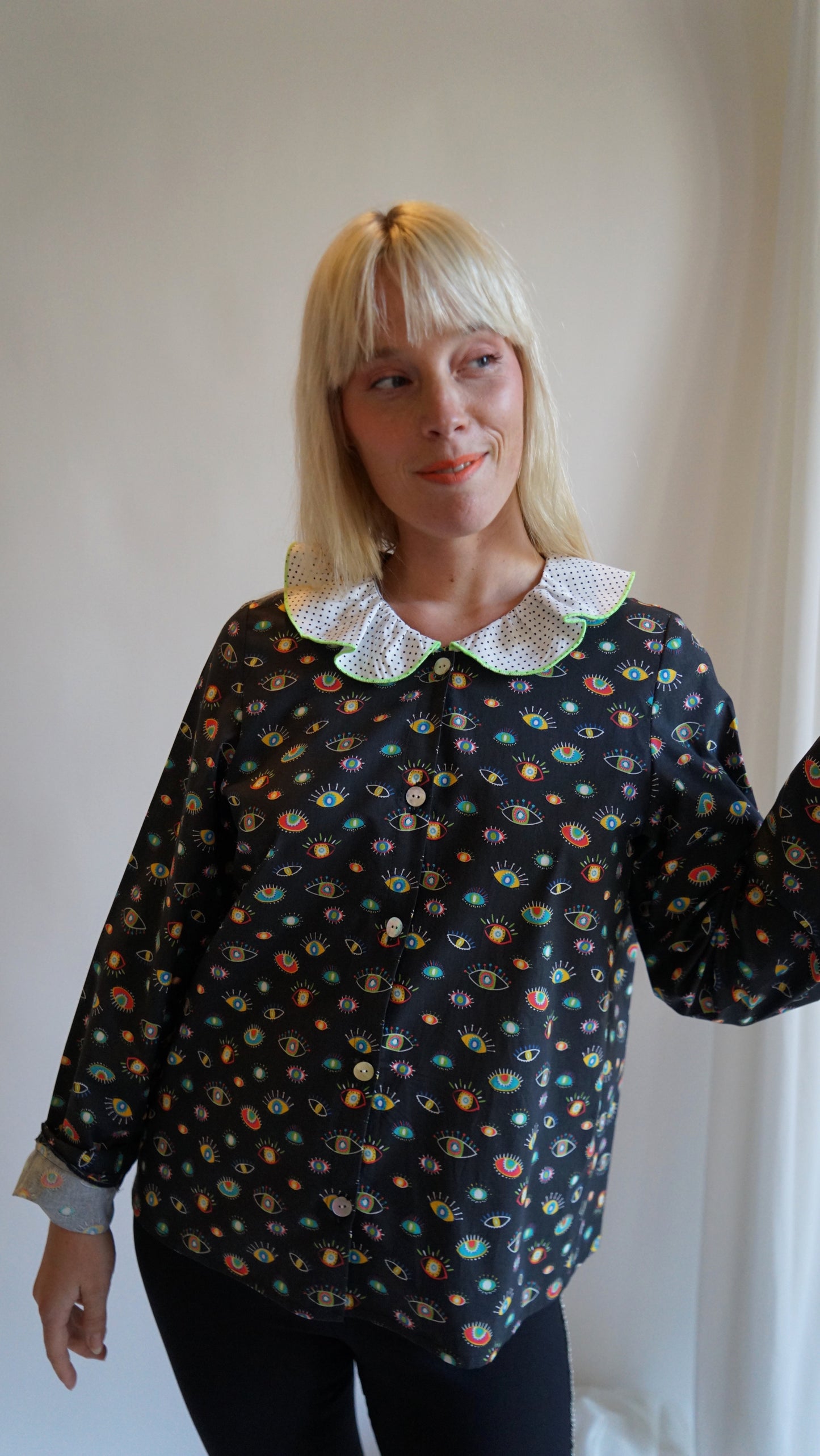 Black Shirt with Eyes Print