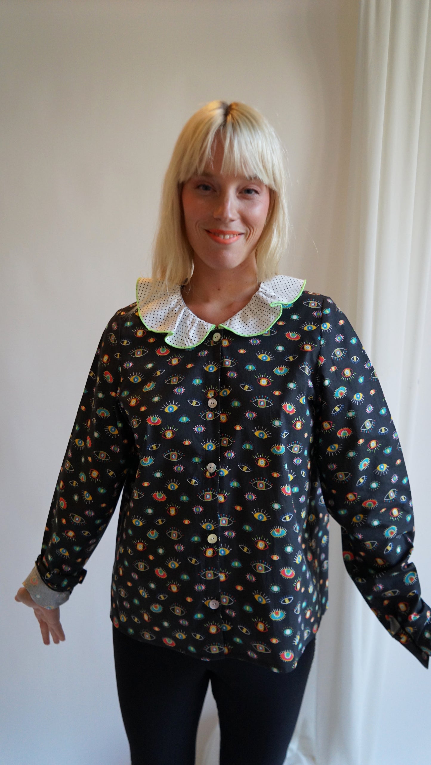 Black Shirt with Eyes Print